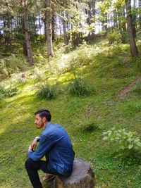 Side view of a man in forest