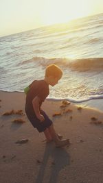 View of beach at sunset