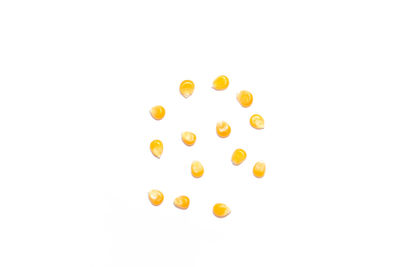 Close-up of yellow over white background