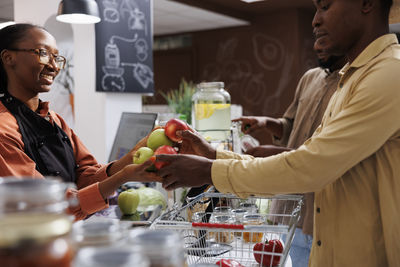 Young man preparing food at home