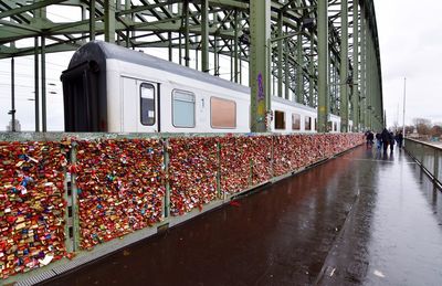 People at hohenzollern bridge with train