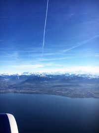 Scenic view of sea against blue sky