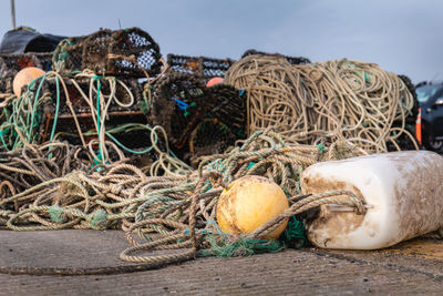 Close-up of fishing net on shore