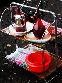 High angle view of red wine in glass on table