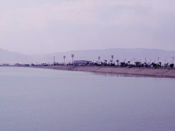 Scenic view of landscape against sky during winter