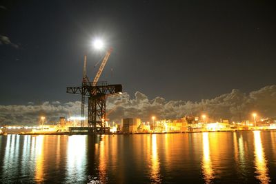 Reflection of illuminated buildings in water