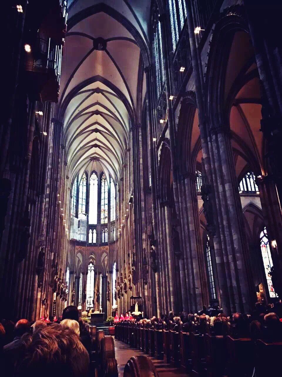 place of worship, religion, indoors, spirituality, architecture, church, arch, built structure, illuminated, architectural column, cathedral, famous place, travel destinations, low angle view, interior, tourism, history, travel