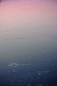 Scenic view of sea against sky at sunset