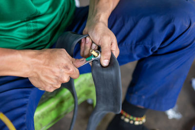 Midsection of man working