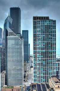 Low angle view of skyscrapers against sky