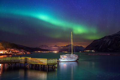 Scenic view of sea with northern lights