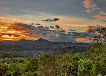 Scenic view of landscape against sky during sunset