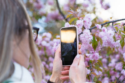 Young woman using mobile phone