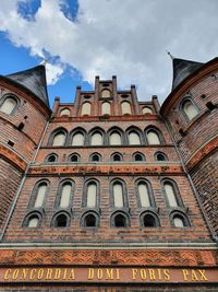 Low angle view of historical building against sky