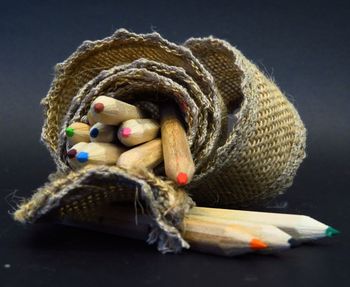 Close-up of stuffed toy against black background
