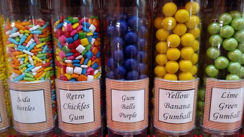 Colorful candies in jar at candy store