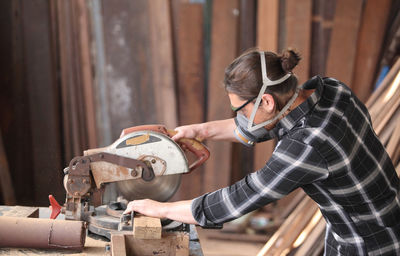 Man working on wood