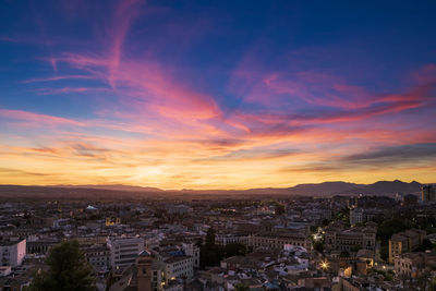 High angle view of townscape against sky during sunset