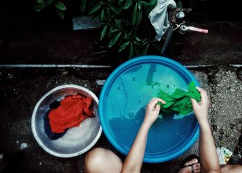 Low section of baby girl in bowl