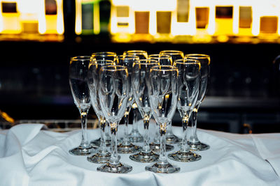 Close-up of wine glasses on table