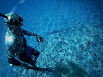Man swimming in sea