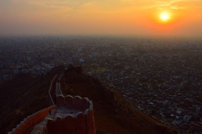 High angle view of city during sunset