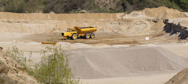 Gravel quarrying in a gravel pit during a drone flight