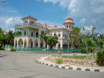 Facade of historic building against sky