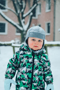 Portrait of cute boy in snow