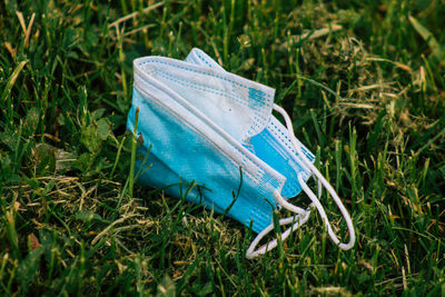 High angle view of blue umbrella on field