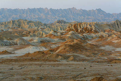 Mars mountains located in chabahar at sunset, baluchistan province. soil erosion close to the ocean