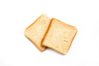 High angle view of bread on white background