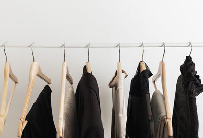 Close-up of clothes hanging on rack