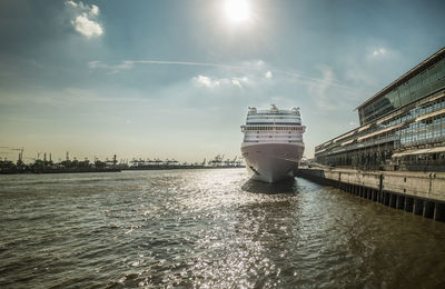 Cruise ship sailing in sea against sky