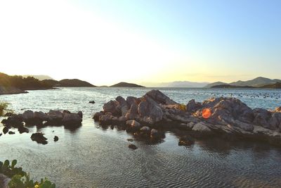 Scenic view of sea at sunset