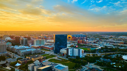 High angle view of cityscape against sky during sunset