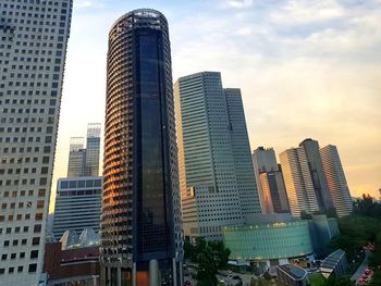 Low angle view of buildings against sky in city