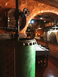 Close-up of illuminated machine in restaurant