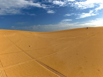 Scenic view of desert against sky