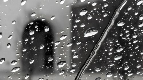 Full frame shot of wet car window