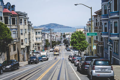 View of road along buildings