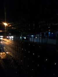 Close-up of illuminated lights at night