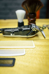 Close-up of equipment on table