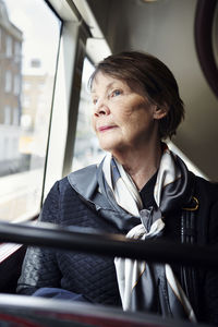 Senior woman in bus