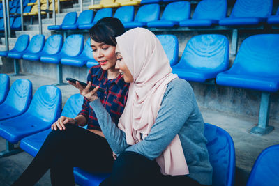 Young woman using mobile phone