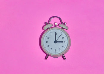 Close-up of clock on wall