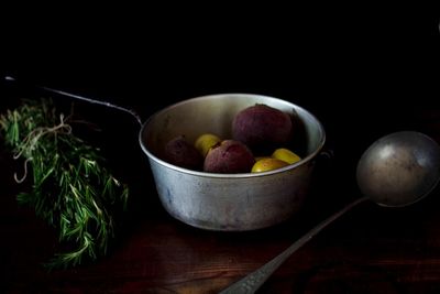 Close-up of fruits in bowl on table