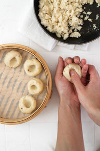 High angle view of woman preparing food