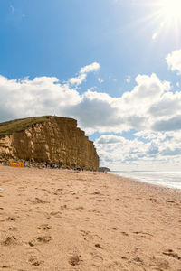 Scenic view of beach against sky