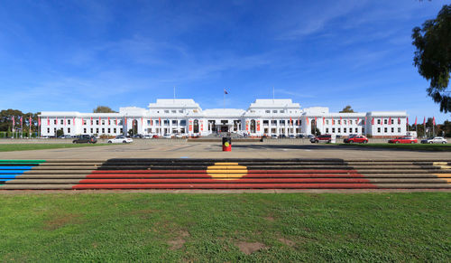 View of buildings against blue sky